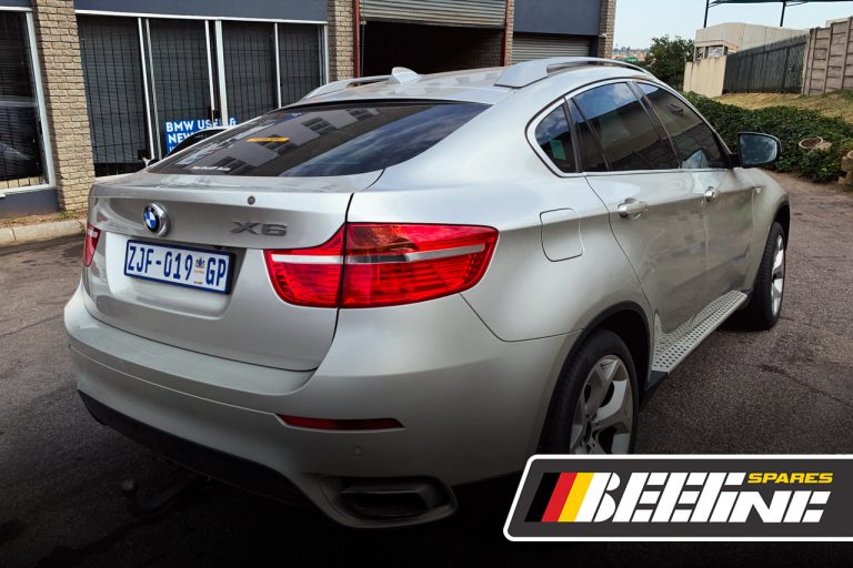 BMW X6 50i Stripping for used spares, wheels and body panels back angle view